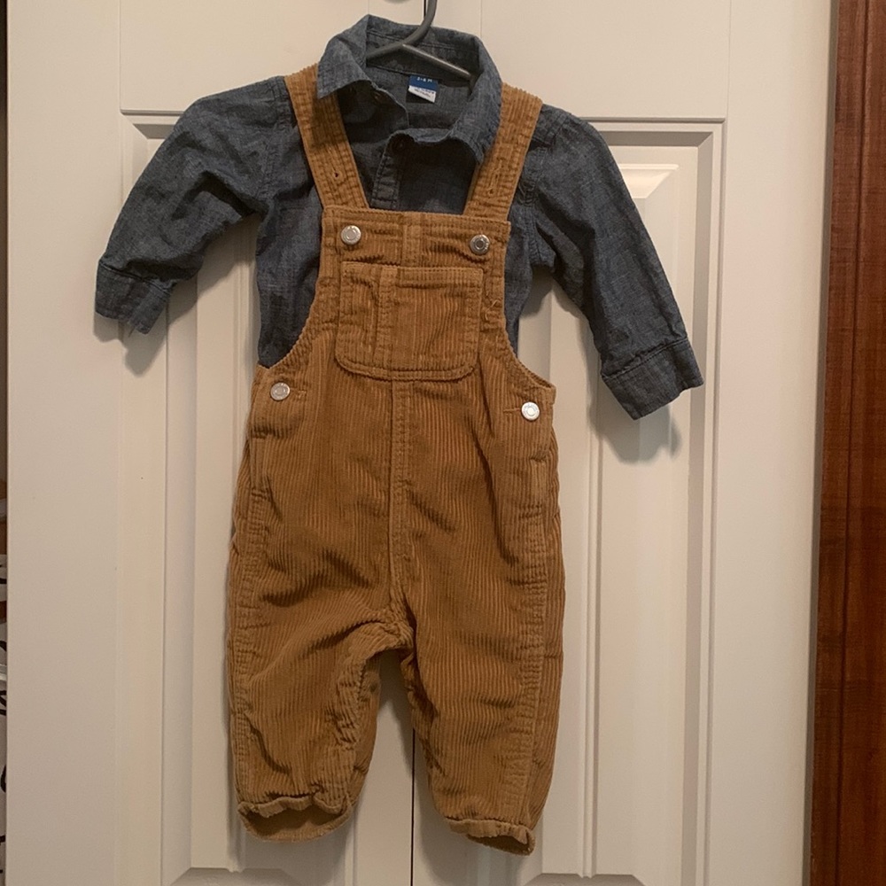 Corduroy overalls with denim shirt.